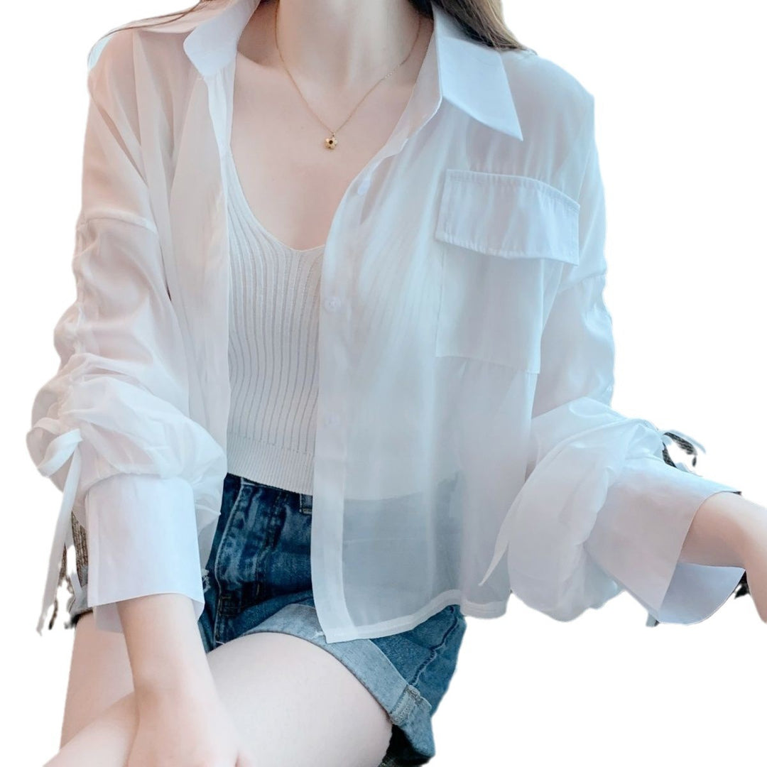 Kvinnors Transparent Blus med Innovativa Detaljer Mirla-Eva Jonsson