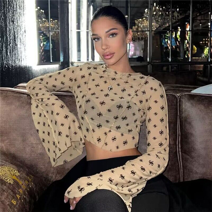 Kvinnors Transparent Top med Långa Ärmar och Delikat Mönster Mirla-Eva Jonsson