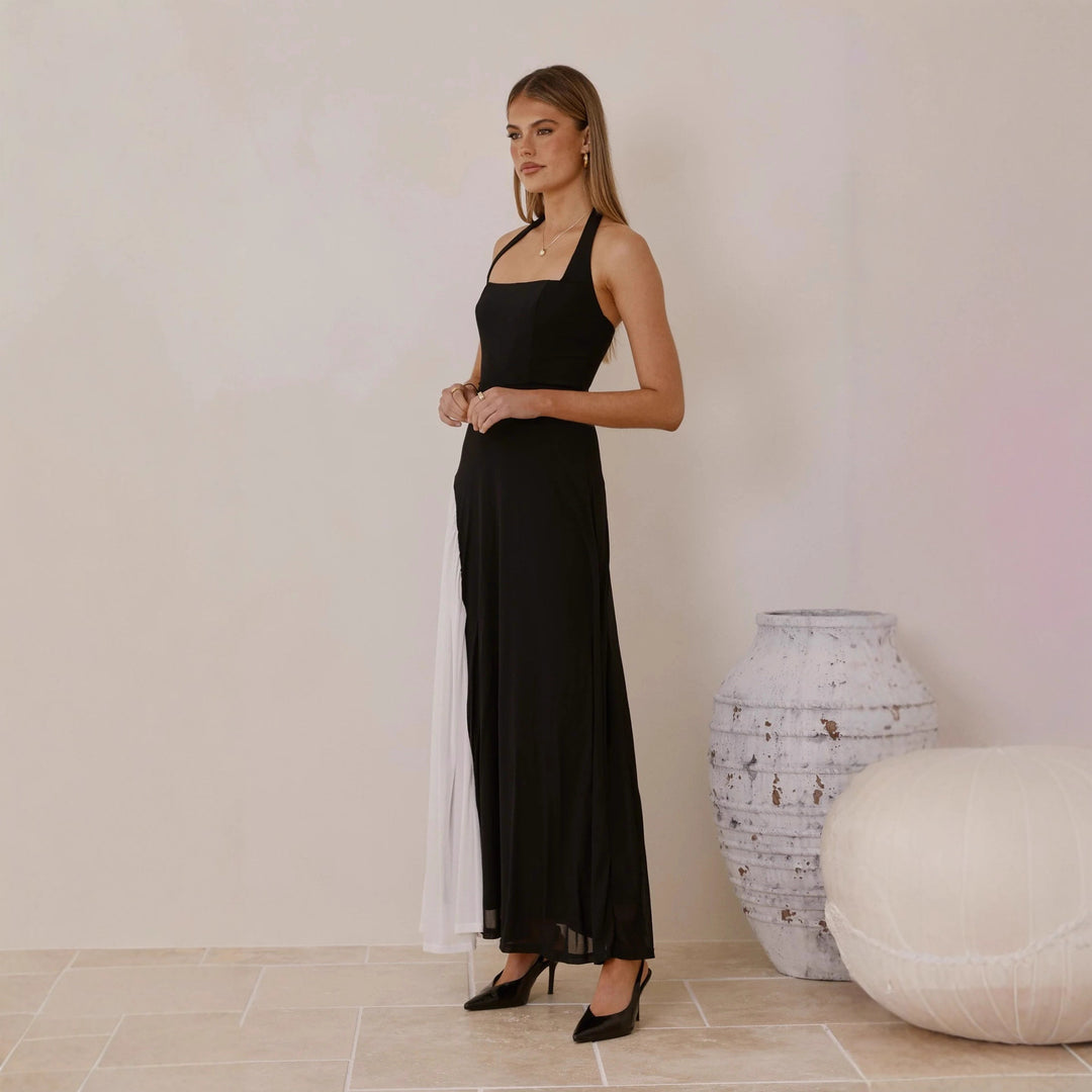 Kvinnors aftonklänning med asymmetrisk skärning och eleganta accenter Mirla-Eva Jonsson
