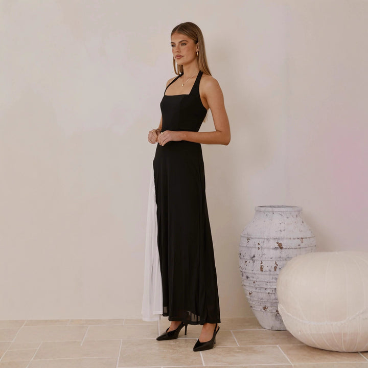 Kvinnors aftonklänning med asymmetrisk skärning och eleganta accenter Mirla-Eva Jonsson