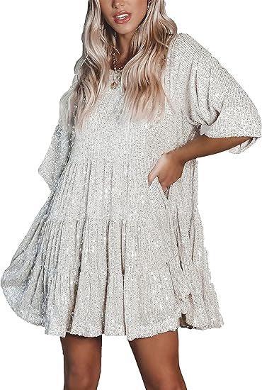 Kvinnors aftonklänning med glittrande paljetter Mirla-Eva Jonsson