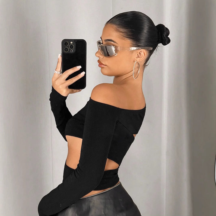 Kvinnors asymmetrisk crop top med urklippsdetaljer Mirla-Eva Jonsson