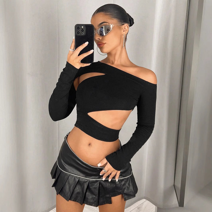 Kvinnors asymmetrisk crop top med urklippsdetaljer Mirla-Eva Jonsson