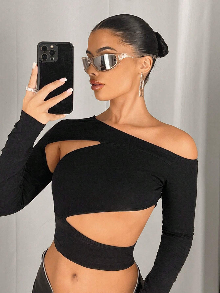 Kvinnors asymmetrisk crop top med urklippsdetaljer Mirla-Eva Jonsson