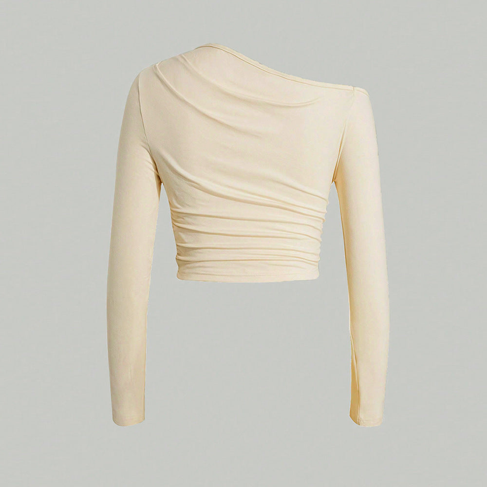 Kvinnors asymmetrisk långärmad crop top med lätt rynkeffekt Mirla-Eva Jonsson