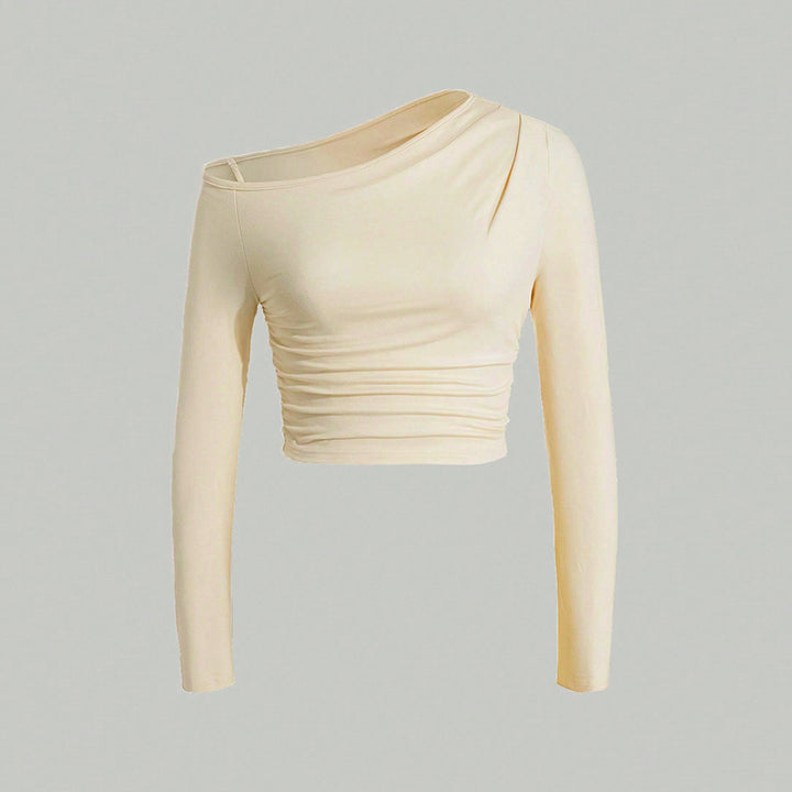 Kvinnors asymmetrisk långärmad crop top med lätt rynkeffekt Mirla-Eva Jonsson