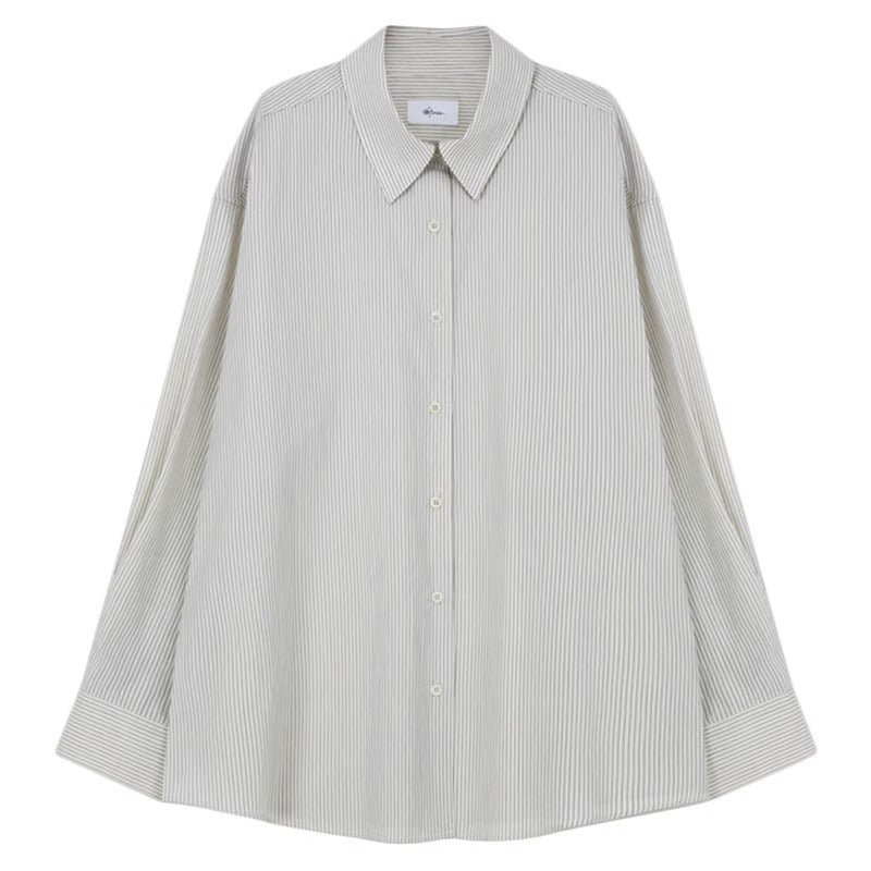 Kvinnors asymmetrisk skjortblus med elegant omslagslook Mirla-Eva Jonsson