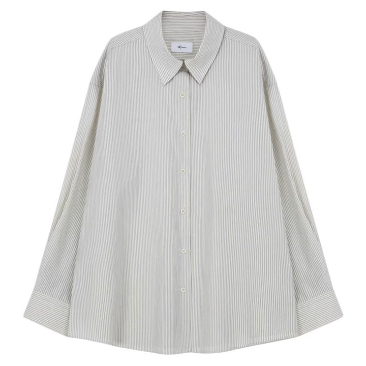 Kvinnors asymmetrisk skjortblus med elegant omslagslook Mirla-Eva Jonsson