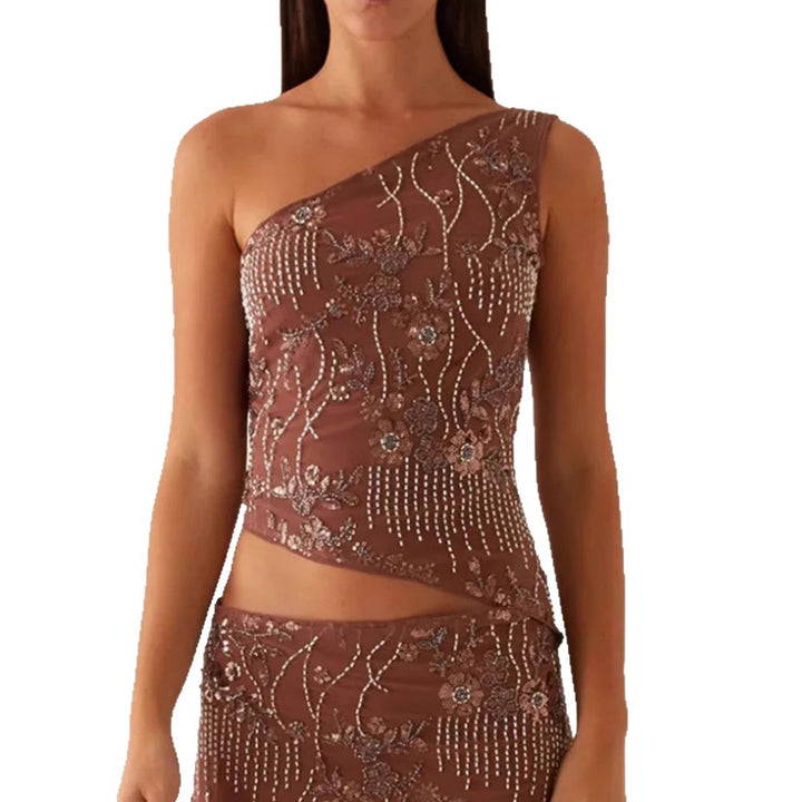 Kvinnors asymmetrisk topp med blommig rhinestone-design Mirla-Eva Jonsson