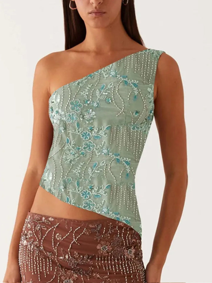 Kvinnors asymmetrisk topp med blommig rhinestone-design Mirla-Eva Jonsson