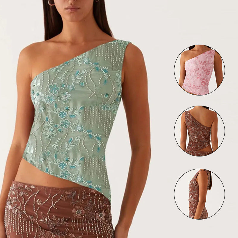 Kvinnors asymmetrisk topp med blommig rhinestone-design Mirla-Eva Jonsson