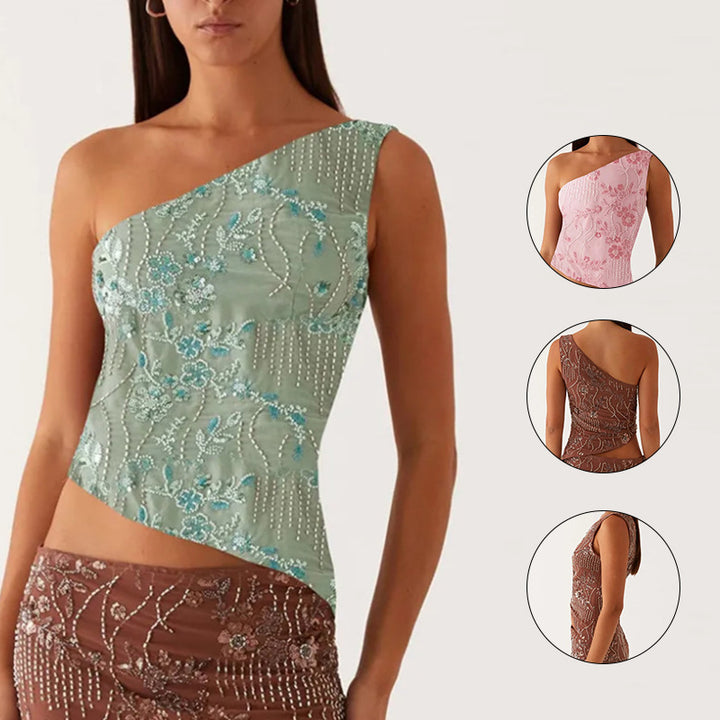 Kvinnors asymmetrisk topp med blommig rhinestone-design Mirla-Eva Jonsson