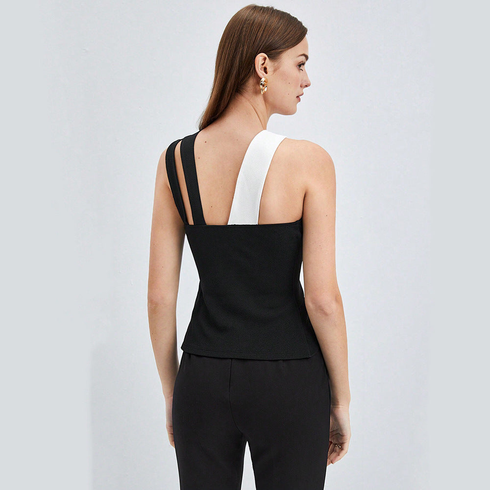 Kvinnors asymmetrisk topp med elegant omslagsdesign och fina volanger Mirla-Eva Jonsson