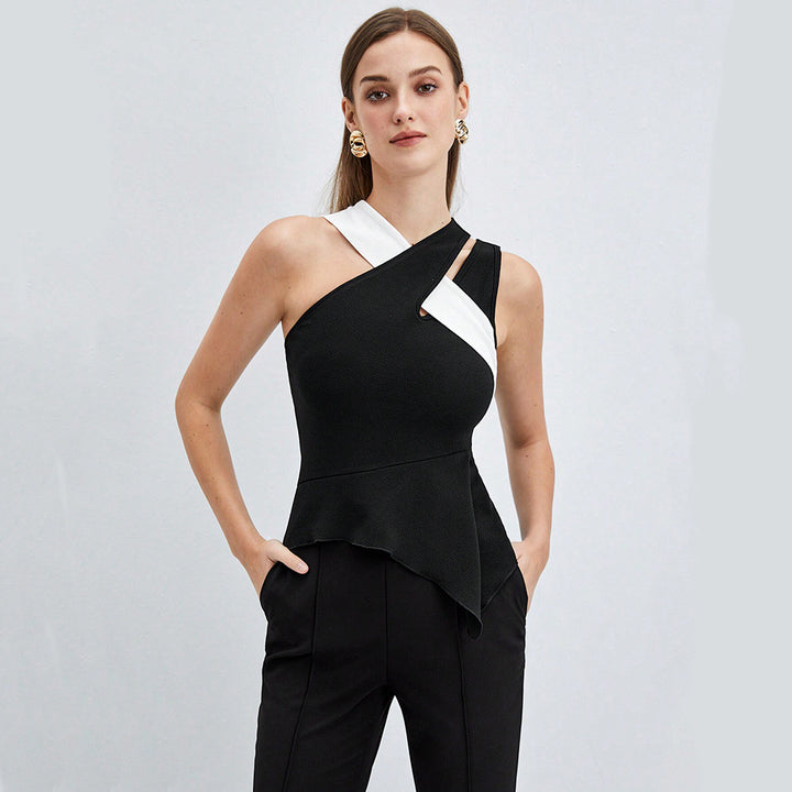 Kvinnors asymmetrisk topp med elegant omslagsdesign och fina volanger Mirla-Eva Jonsson