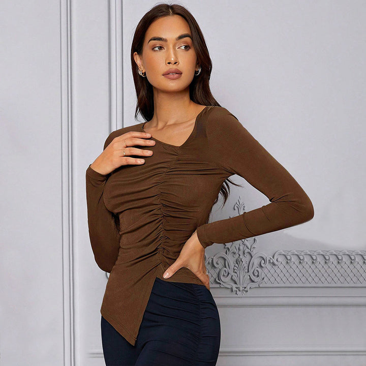 Kvinnors åtsittande långärmad topp med asymmetrisk draperingsdesign Mirla-Eva Jonsson