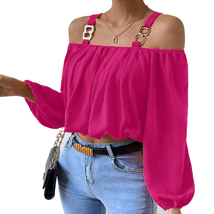 Kvinnors avaxelblus med dekorativa remmar och elegant drapering Mirla-Eva Jonsson