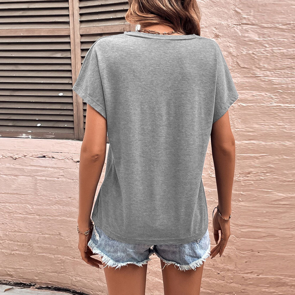 Kvinnors avslappnad V-ringad T-shirt med sänkt ärm Mirla-Eva Jonsson