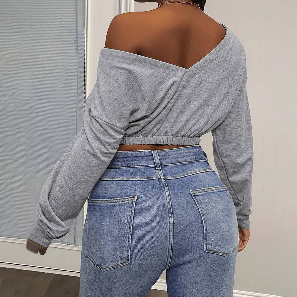 Kvinnors avslappnad crop top med off-shoulder design och åtsittande nederkant Mirla-Eva Jonsson