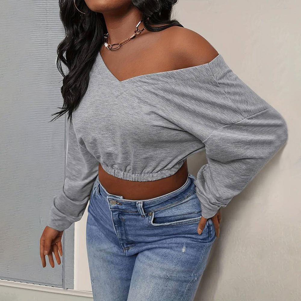 Kvinnors avslappnad crop top med off-shoulder design och åtsittande nederkant Mirla-Eva Jonsson