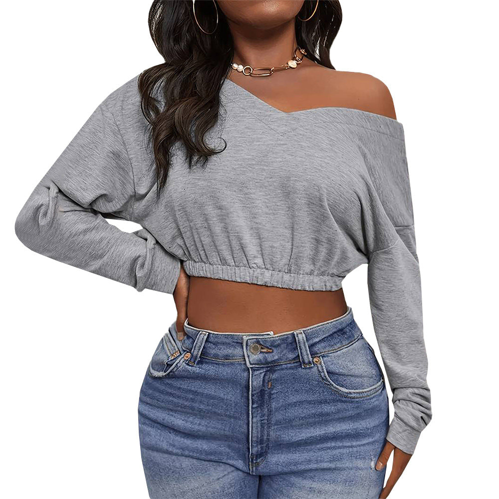 Kvinnors avslappnad crop top med off-shoulder design och åtsittande nederkant Mirla-Eva Jonsson