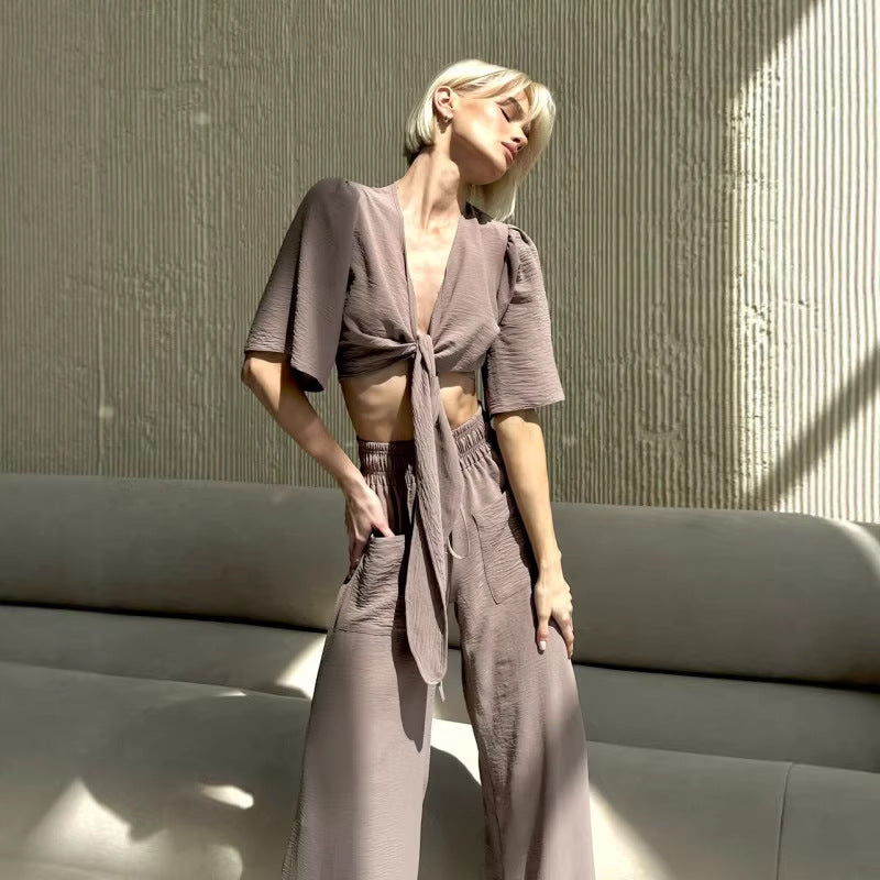 Kvinnors avslappnad crop top och vida högmidjade byxor set Mirla-Eva Jonsson
