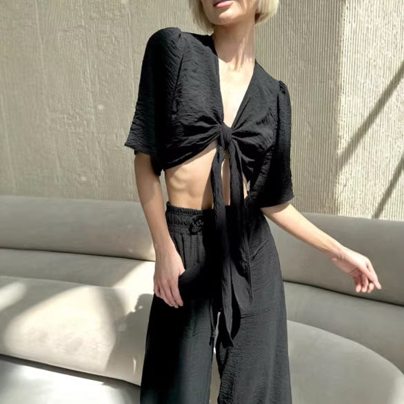 Kvinnors avslappnad crop top och vida högmidjade byxor set Mirla-Eva Jonsson