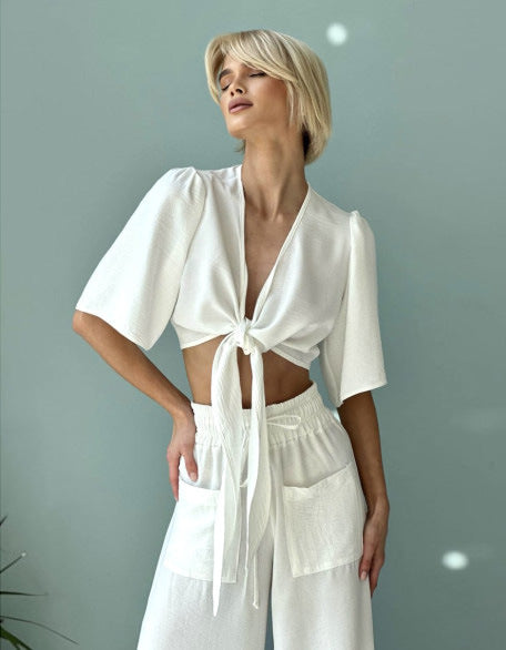 Kvinnors avslappnad crop top och vida högmidjade byxor set Mirla-Eva Jonsson