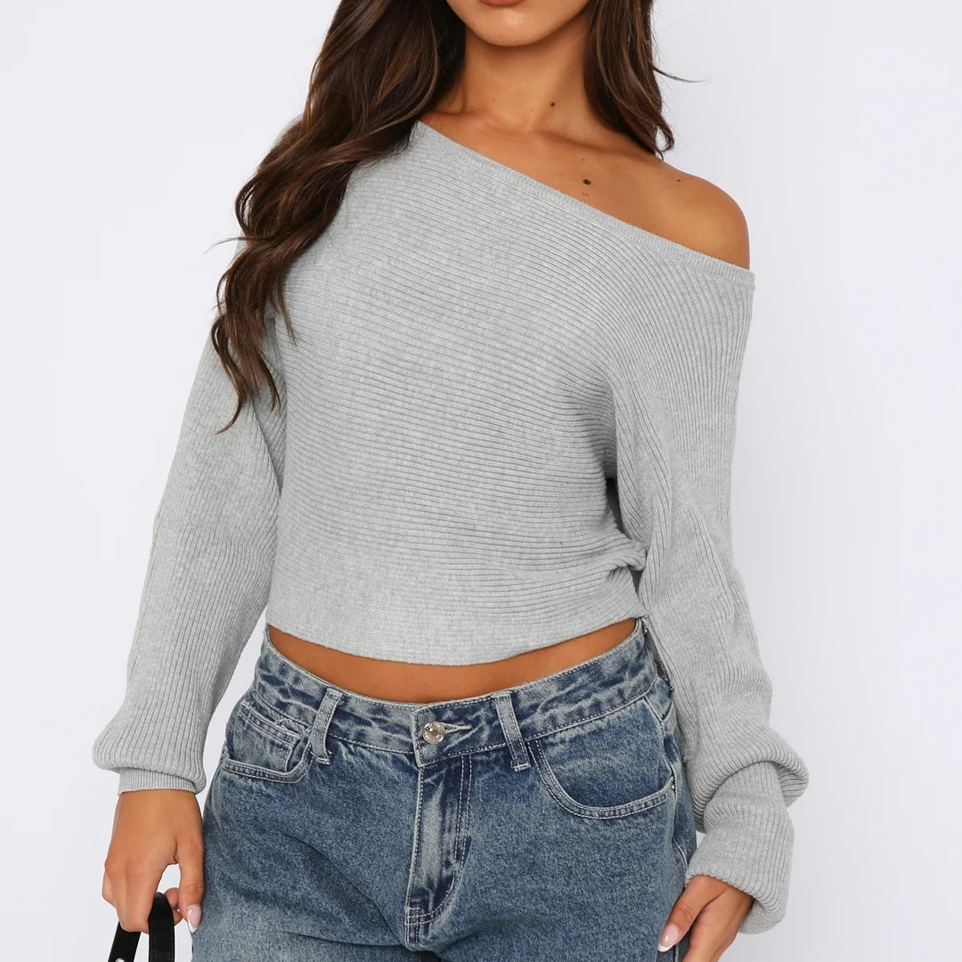 Kvinnors avslappnad crop tröja med asymmetrisk halsringning och ribbad textur Mirla-Eva Jonsson