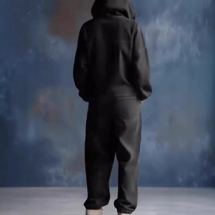 Kvinnors avslappnad denim jumpsuit med huva och praktiska fickor Mirla-Eva Jonsson
