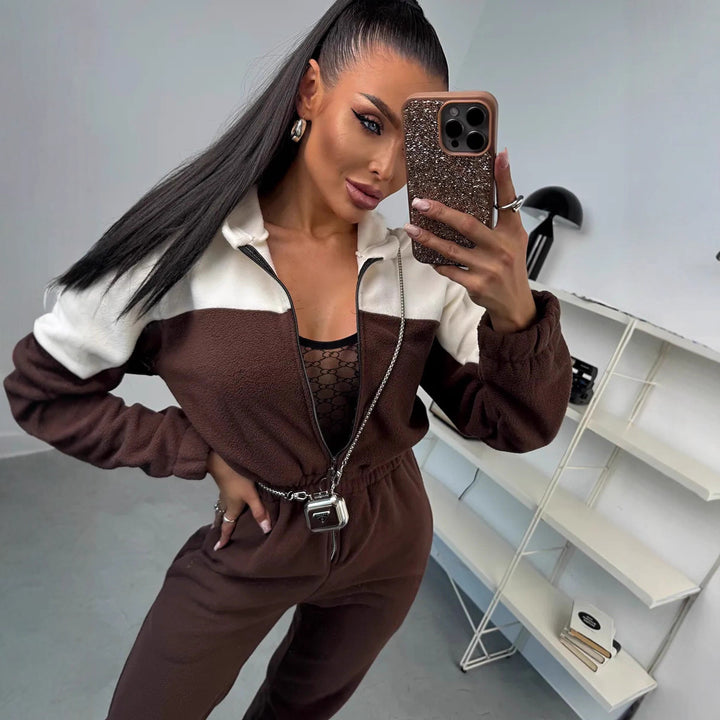 Kvinnors avslappnad fleeceoverall med elegant dragkedja och huva Mirla-Eva Jonsson