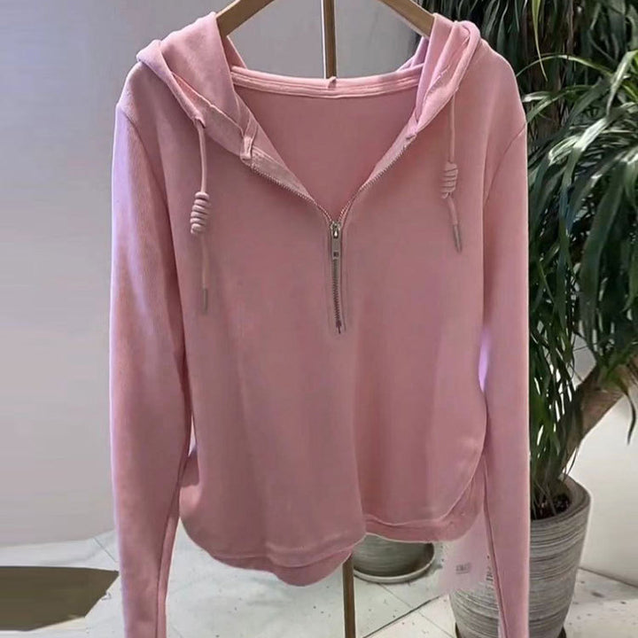 Kvinnors avslappnad hoodie med halv dragkedja och modern skärning Mirla-Eva Jonsson