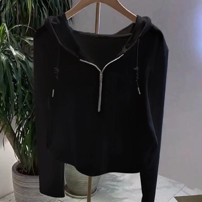 Kvinnors avslappnad hoodie med halv dragkedja och modern skärning Mirla-Eva Jonsson