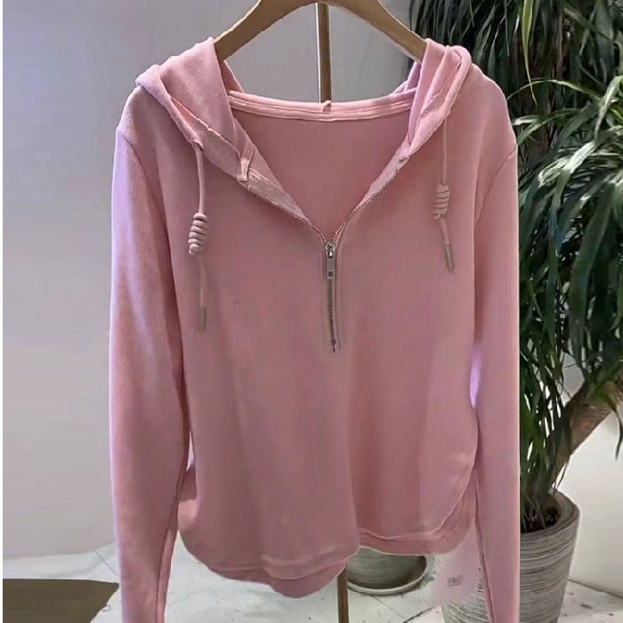 Kvinnors avslappnad hoodie med halv dragkedja och modern skärning Mirla-Eva Jonsson