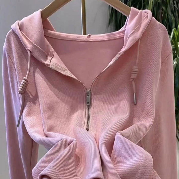 Kvinnors avslappnad hoodie med halv dragkedja och modern skärning Mirla-Eva Jonsson