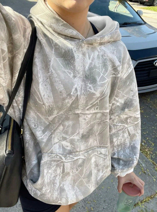Kvinnors avslappnad hoodie med kamouflagemönster Mirla-Eva Jonsson