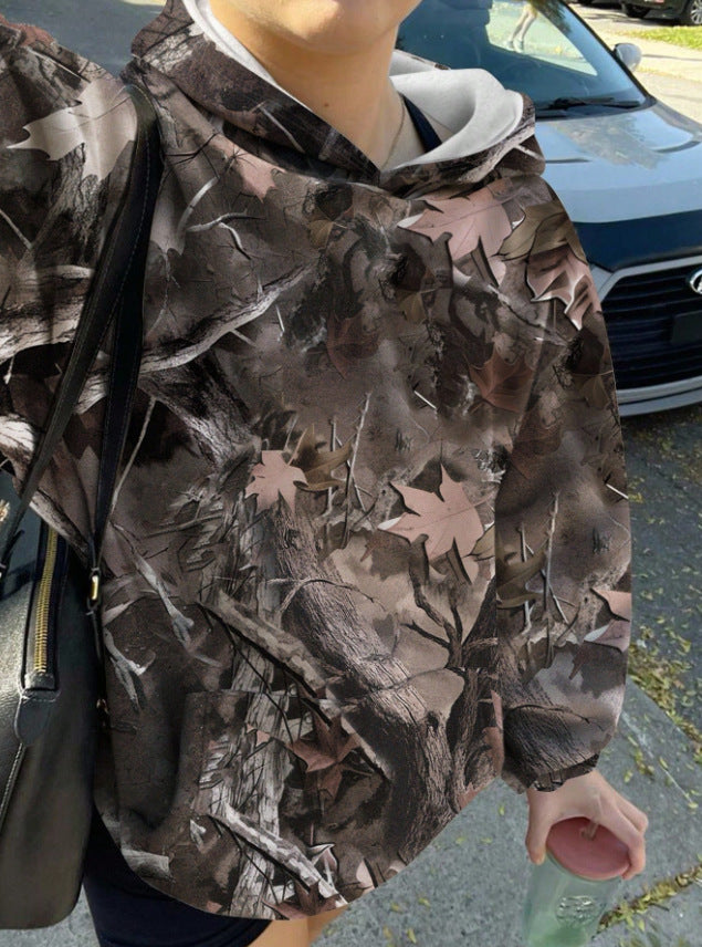 Kvinnors avslappnad hoodie med kamouflagemönster Mirla-Eva Jonsson
