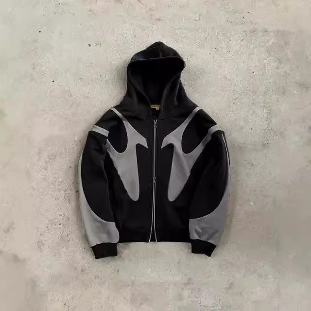 Kvinnors avslappnad hoodie med kontrasterande färgdetaljer och modern skärning Mirla-Eva Jonsson