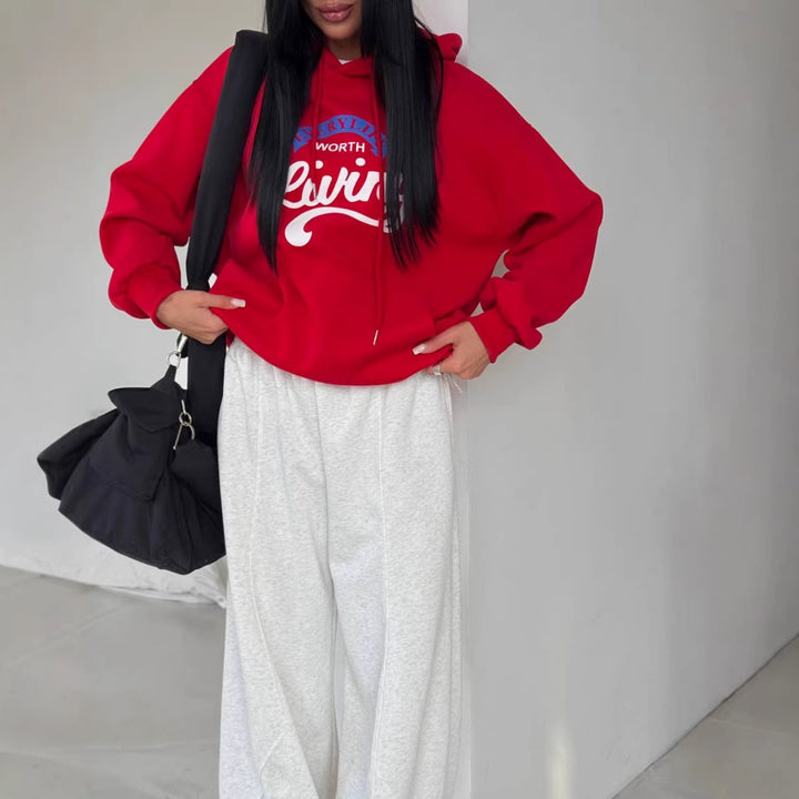 Kvinnors avslappnad hoodie med originaltryck och oversized skärning Mirla-Eva Jonsson