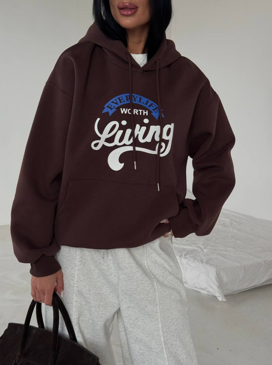 Kvinnors avslappnad hoodie med originaltryck och oversized skärning Mirla-Eva Jonsson