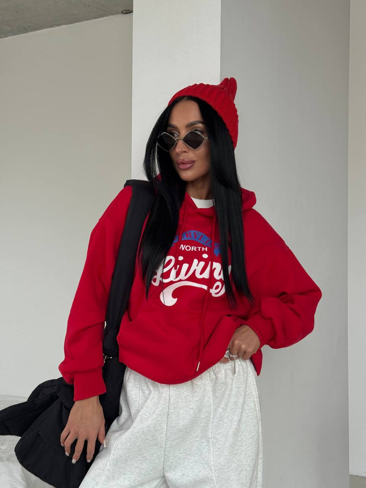 Kvinnors avslappnad hoodie med originaltryck och oversized skärning Mirla-Eva Jonsson