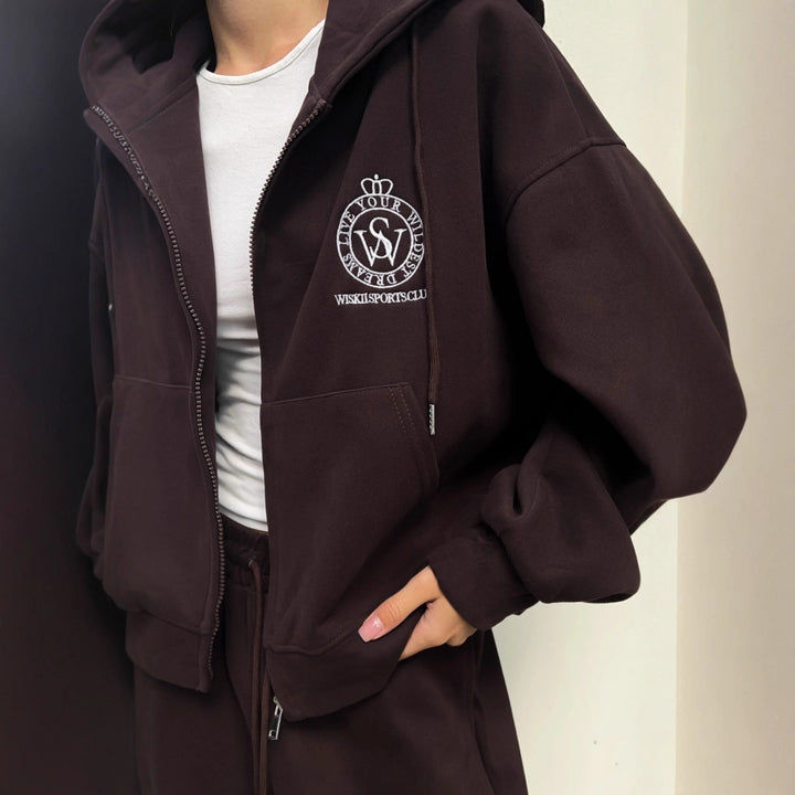 Kvinnors avslappnad hoodie med oversized skärning och elegant logotyp Mirla-Eva Jonsson