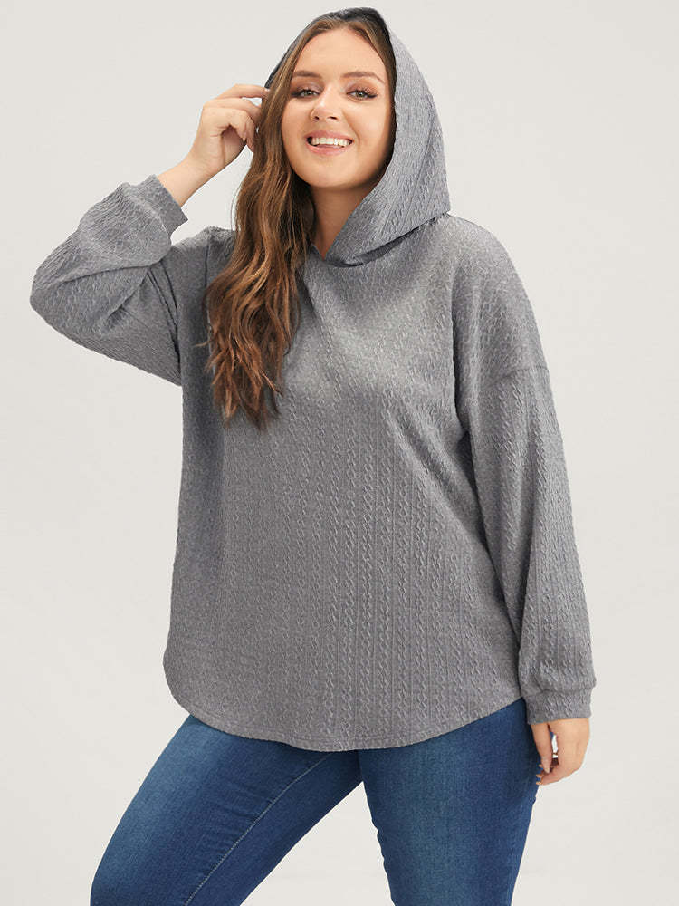 Kvinnors avslappnad hoodie med texturerad design Mirla-Eva Jonsson