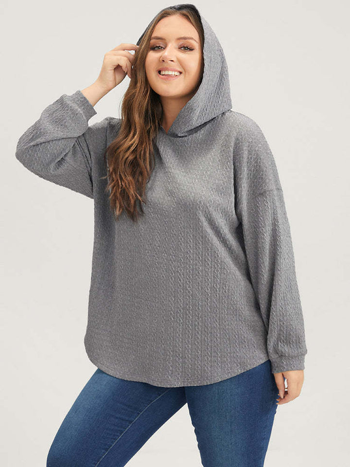 Kvinnors avslappnad hoodie med texturerad design Mirla-Eva Jonsson