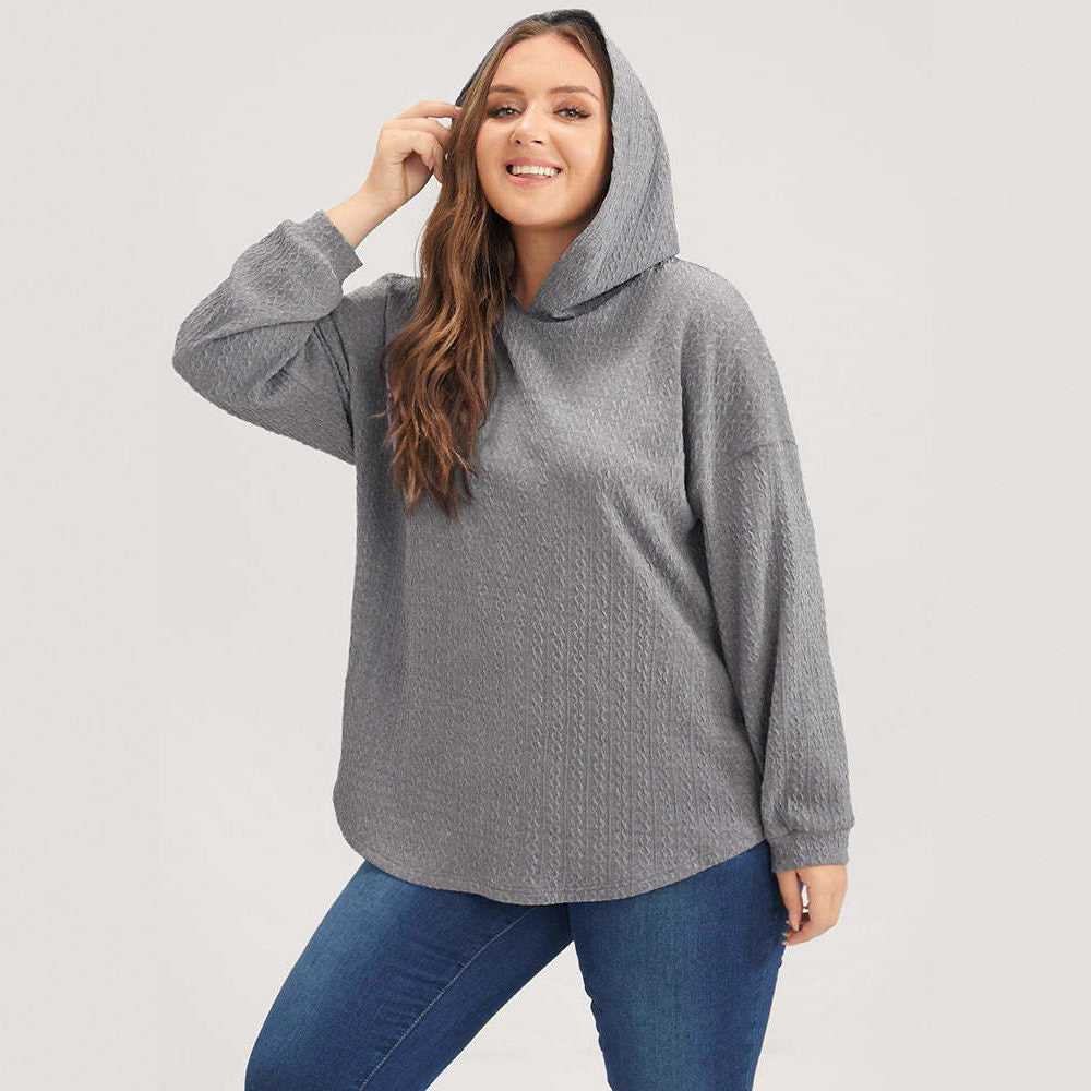 Kvinnors avslappnad hoodie med texturerad design Mirla-Eva Jonsson