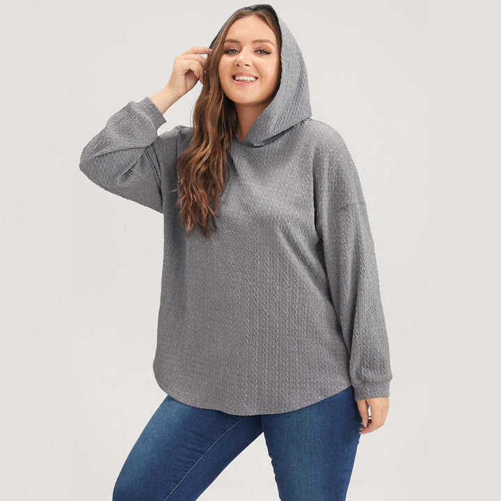 Kvinnors avslappnad hoodie med texturerad design Mirla-Eva Jonsson