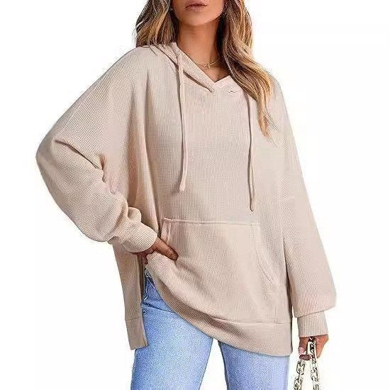 Kvinnors avslappnad hoodie med texturerad design och sänkta axlar Mirla-Eva Jonsson