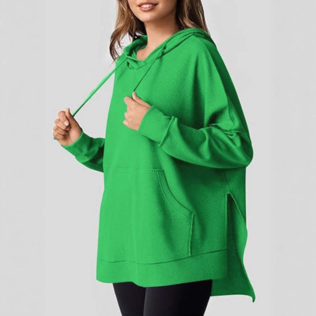 Kvinnors avslappnad hoodie med texturerad design och sänkta axlar Mirla-Eva Jonsson