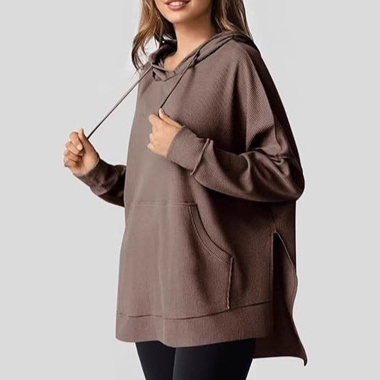 Kvinnors avslappnad hoodie med texturerad design och sänkta axlar Mirla-Eva Jonsson