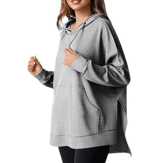 Kvinnors avslappnad hoodie med texturerad design och sänkta axlar Mirla-Eva Jonsson