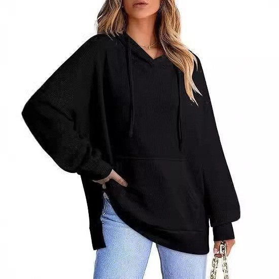 Kvinnors avslappnad hoodie med texturerad design och sänkta axlar Mirla-Eva Jonsson
